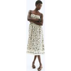 H&M Dame Sortblomstret Kjole Med Smock - Creme/Sort