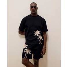 Tops River Island Black Oversized Plisse Palm Tee T-Shirt