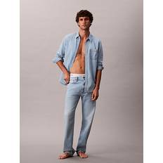 Calvin Klein Ensfarvet Bukser & Shorts Calvin Klein Jeans Med Lige Ben Lyseblå Vask - Blue