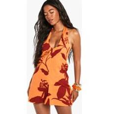 Orange Jumpsuits & Overalls boohoo Tropical Print Halterneck Playsuit - Orange