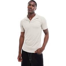 Natural Polo Shirts ASOS DESIGN Polo In Stone Textured Rib - Neutral