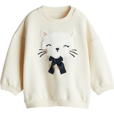 H&M Sweatshirt mit Rundausschnitt - Cremefarben/Katze (1243160002)