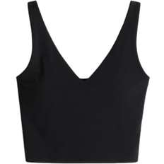 4XL Bras H&M Medium Support Yoga Bra with SoftMove Lycra - Black
