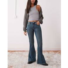 Katsumi Utsvängda Jeans Med Låg Midja Och Rosettutsmyckning - Blå