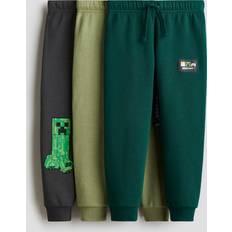 Enfärgade Tracksuits Barnkläder H&M 3-Pack Joggers Med Tryck - Grön