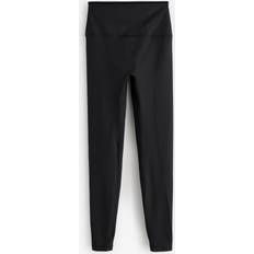 New Balance Strumpbyxor & Stay-ups New Balance Ribbed High Rise Legging 27 - Svart