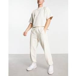 New Balance Pantaloni da tuta - Écru