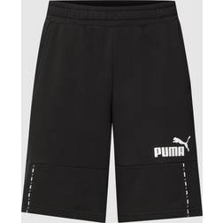 Puma PERFORMANCE Shorts mit Label-Details in Schwarz, Größe