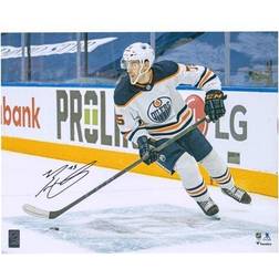 Evan Bouchard Edmonton Oilers Autographed x White Jersey with Puck Photograph