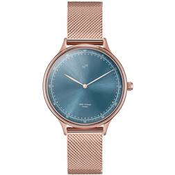 About Vintage 1969 Petite, Rose Gold Blue Sunray