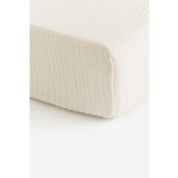 H&M Baby - Faconsyet lagen i musselin babyseng