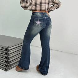 Shein Slim Flared Jeans mit Sternenmuster - Blau
