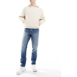 ASOS DESIGN Slim Jeans - Mid Wash Blue