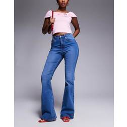 ASOS DESIGN Super Stretch Flare Jeans - Dark Mid Blue