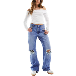 Bershka Mellanblå Jeans Med Vida Ben Och Slitna - Knän
