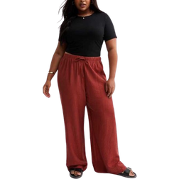 New Look Curves Crinkled Wide Leg Trousers - Dark Orange