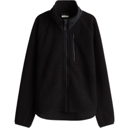 H&M Move Sportjacke aus Teddyfleece - Schwarz