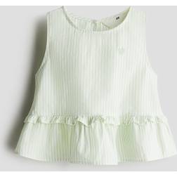 H&M Peplumshirt aus Baumwolle - Hellgrün/Gestreift