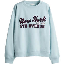 H&M Sweatshirt with Text Motif - Light Blue/New York