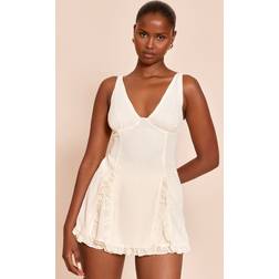 PrettyLittleThing Frill Pleated Detail Playsuit - White