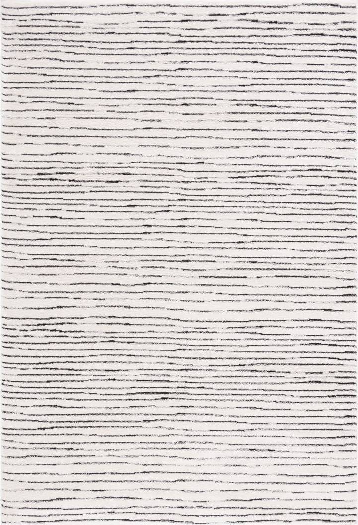 Blue Elephant Machine Woven Polyester Ivory/Black Rug