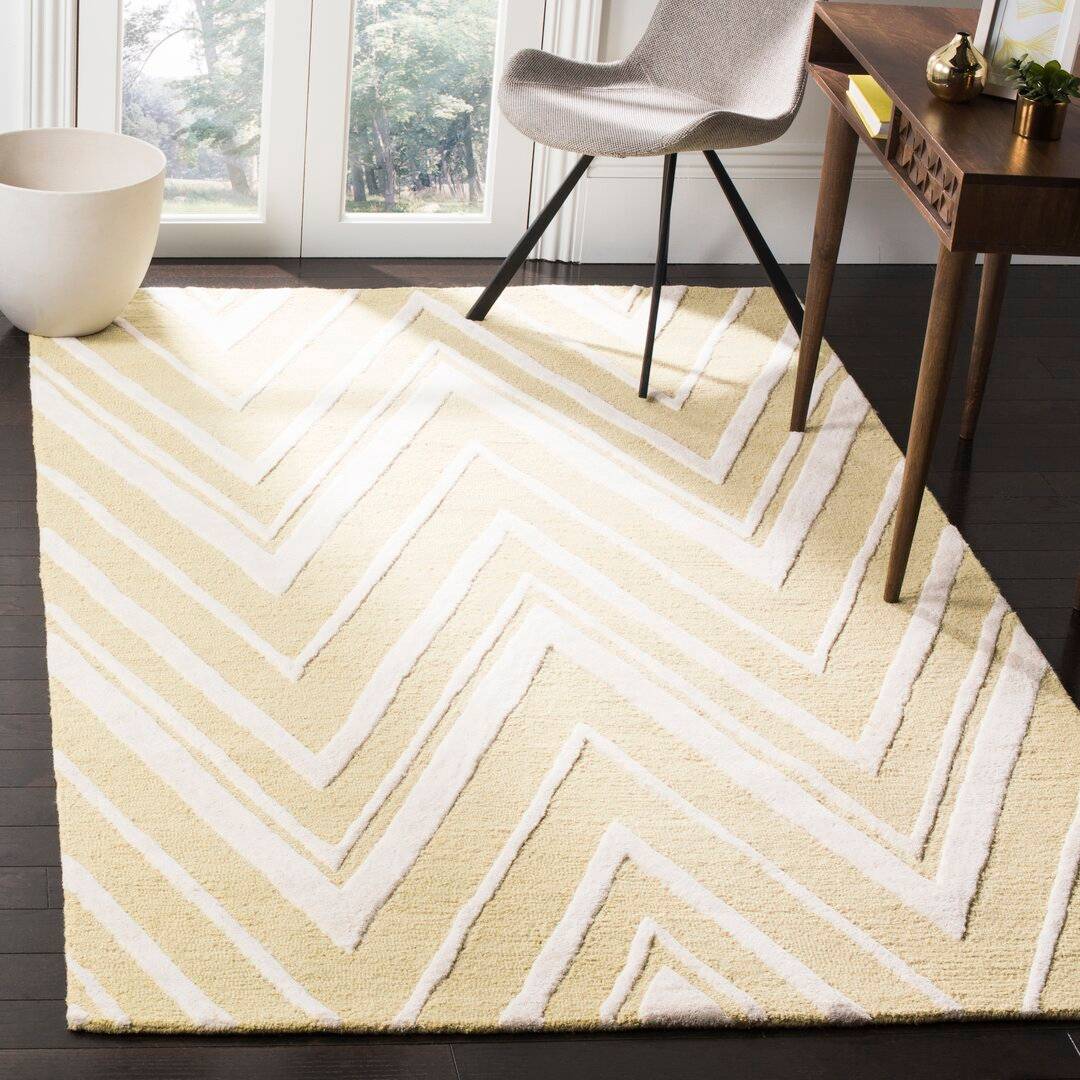 Ebern Designs Hand Tufted Wool Light Gold Ivory Rug 182 x 274 cm