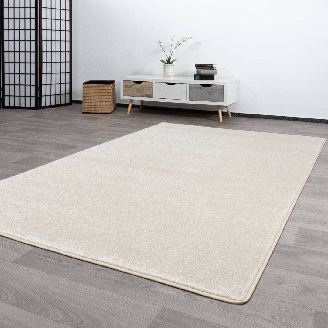Ebern Designs Irinel Solid Colour Machine Woven Machine Tufted Area Rug 170 x 240 cm