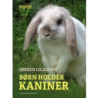 Børn holder kaniner