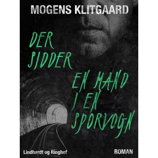 Der sidder en mand i en sporvogn