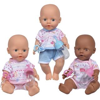 Nyfødt baby: tissende dukke i lyserødt tøj