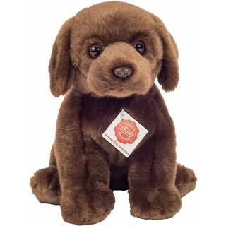 Labrador bamse hvalp, der sidder Legetøjshund ligner ægte
