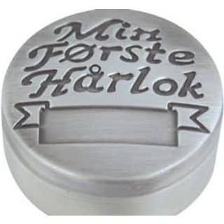 Min første hårlok fortinnet