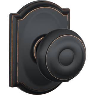 Schlage F10 Geo 716 Cam Georgian Door Knob med Camelot Trim Hall & Closet Passage Lock Aged Bronze