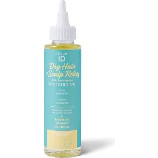 Tekstur -id t?rt h?r og hovedbunds lettelse beroligende olie