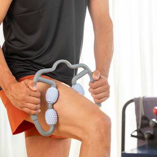 Massagerulle med 4 effektive rullehoveder til arme, ben og nakke
