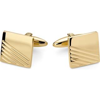 Stilrene guldfarvede manchetknapper