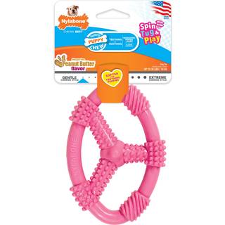 Nylabone Spin Tug & Play Puppy Chew Ring Legetøj Legetøj til tænder hvalpe Jordnøddesmør smag lyserød medium - op til 35 lbs 1 tælling