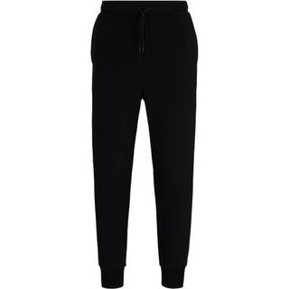 Tracksuit-bukser i bomuld med stræk og logoprint