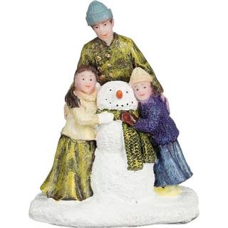 Luville Familie bygger snemand