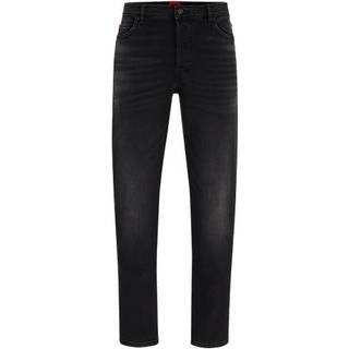 Jeans med tapered fit i sort denim med stræk
