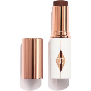 Charlotte Tilbury - Unreal Skin Sheer Glow Tint - Fugtgivende Foundation Stick - Unreal Skin Sheer Glow Tint - 16 - For Women - Beige