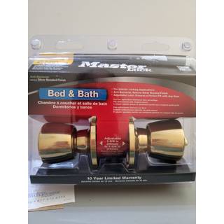 Master Lock TUO0303 Tulip Door Knob med l?s poleret messing