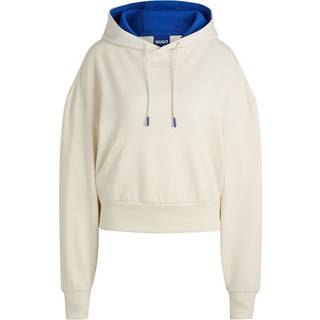 Hættetrøje med cropped design i en sweatkvalitet af bomuld med hætte med blåt for