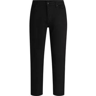 Jeans med tapered fit i ultrasort denim med stræk