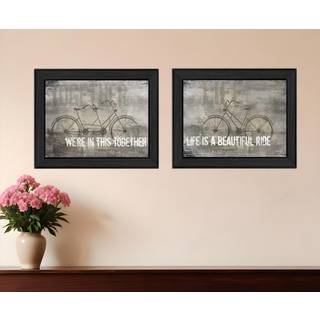 S?t med to i dette sammen sort indrammet printv?gskunst