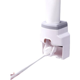 Tandbørsteholder med tandpasta dispenser