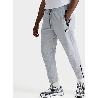 Vævede Nike Tech-bukser med åben kant til mænd - grå - S