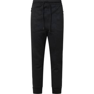 Tracksuit-bukser med relaxed fit og jacquardvævede cirkler
