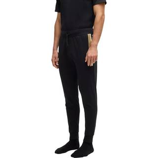 Tracksuit-bukser i bomuldsfrotté med logo og stribet print