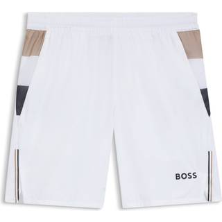 Tennisshorts til træning i stof med stræk og fugtkontrol